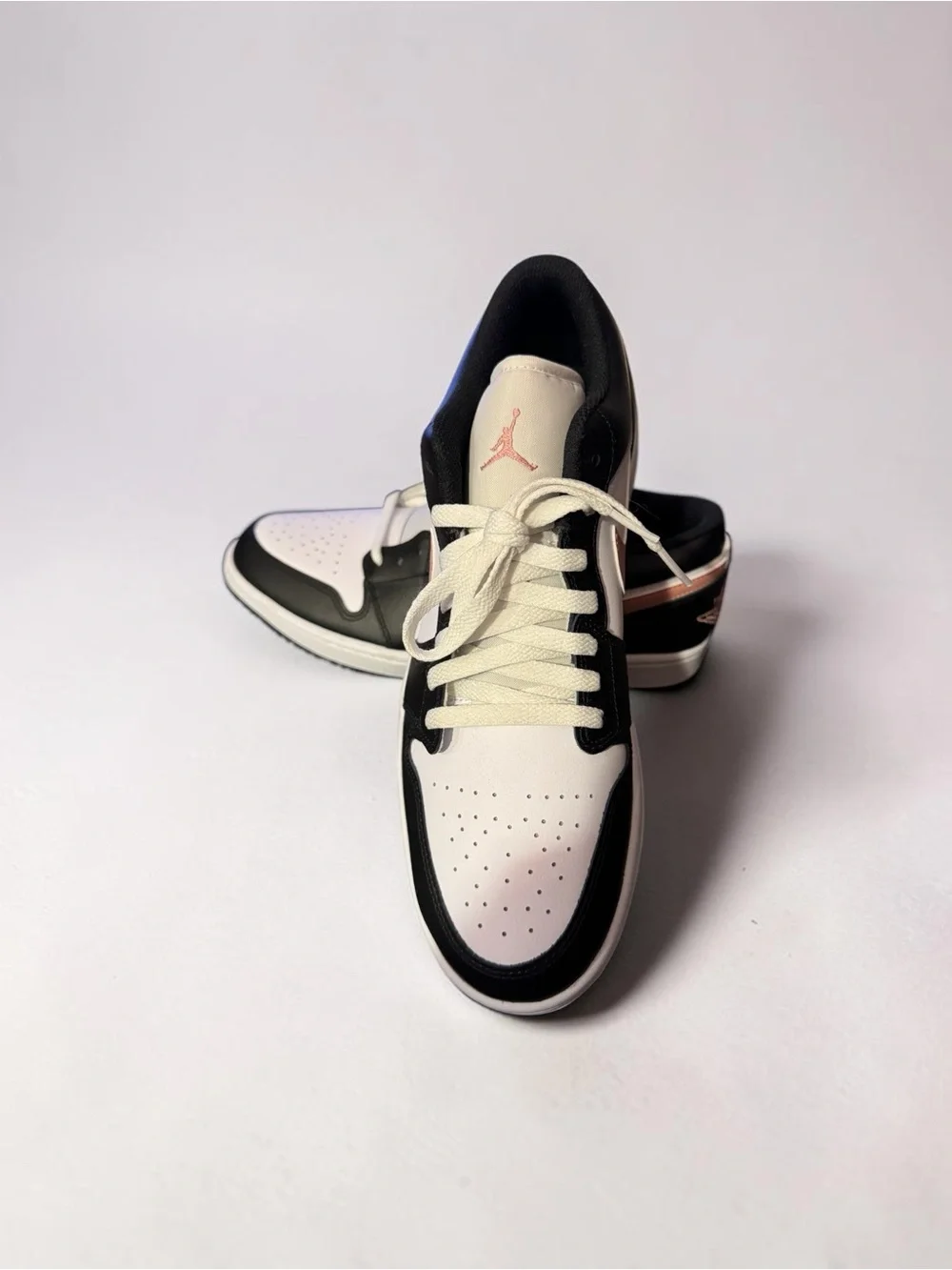 Air Jordan 1 Low “Rust Pink” / “Black Rust Pink.”